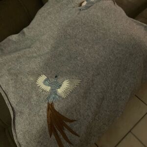 La Fiorentina Gray Poncho with embroidered birds.